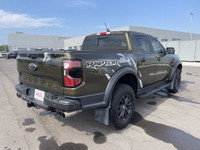 The 2024 Ford Ranger Raptor, finished in Shelter Green with refined Ebony leather-trimmed seats, is... (image 8)