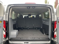 Rear-wheel drive, advanced stability control, 8-passenger capacity, and convenient safety features a... (image 6)