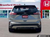 Command the road and embrace adventure in this sophisticated 2023 Ford Edge SEL, striking in Silver.... (image 4)