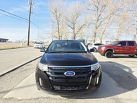Zoomer Auto Text/Call for Viewing 403-615-5797 Sunroof Backup Camera Power Heated Seats 2013 Ford Ed... (image 1)