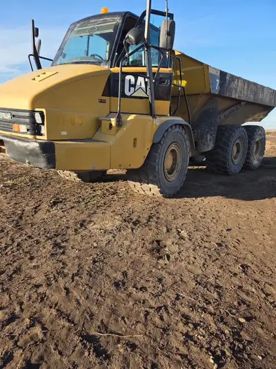 2012 Caterpillar 730 Rock Truck Cab /AC 19600 Hours Heated box Reman Engine Located Saskatchewan ...