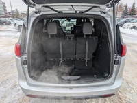 The 2026 Chrysler Grand Caravan SXT in Silver Mist with a Black interior combines versatility, comfo... (image 5)