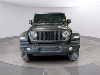 Get ready to command attention with the 2026 Jeep Wrangler Sport, a true symbol of adventure and rug... (image 7)