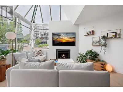 Enjoy easy living steps from the oceanfront and all the best of Ambleside in this stunning, SW-facin...