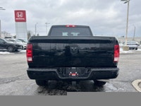 This striking 2023 Ram 1500 Classic SLT Crew Cab Pickup in Diamond Black Crystal Pearl with a Diesel... (image 5)