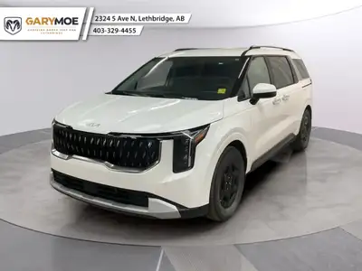 Meet the 2025 Kia Carnival LX, a versatile Van that shines in its vibrant White finish, seamlessly i...