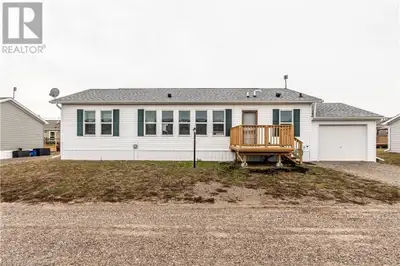 Welcome to this charming 1280 sq ft bungalow, located in a sought-after waterfront community on the...