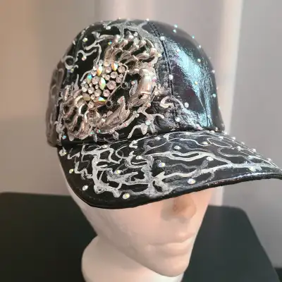 STYLISH BLACK DESIGNER-STYLE CAPBeautiful black glossy cap feat, View more