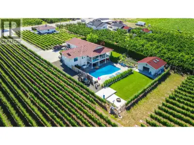 Surrounded by lush vineyards and breathtaking mountain views, this exceptional property is a private...