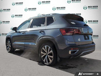 Step into the world of refinement and versatility with the 2022 Volkswagen Taos Highline 4MOTION. Cl... (image 4)