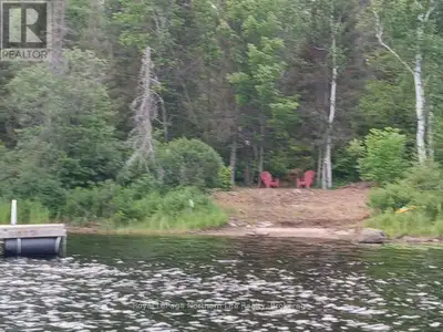 Welcome to your own lakeside retreat on Taggart Lake. 4 acres. Ideal setting to build your dream cot...