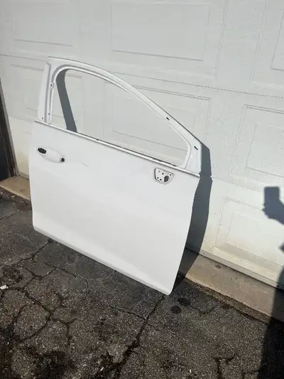 2016-2019 Chevrolet Cruze Right Front Door Shell Used OEM has minor repairable damage see picture as...