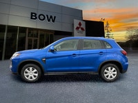 Meet the 2026 Mitsubishi RVR ES, a blue-front-wheel drive SUV that delivers confident handling and a... (image 7)