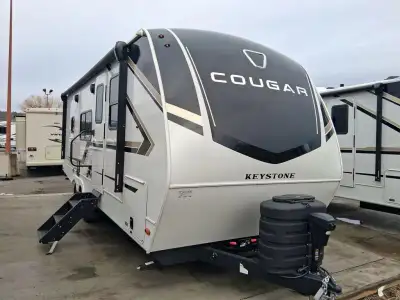 Keystone Cougar Half-Ton travel trailer 22MLSWE highlights: King-Size Bed Theater Seating Booth Dine...