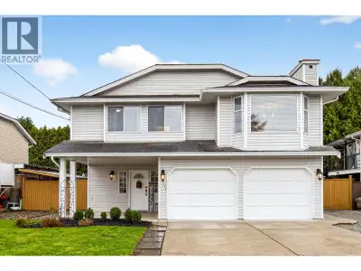 OPPORTUNITY KNOCKS on this two level 5 BEDROOM/3 BATH basement entry home with DOUBLE GARAGE in conv...