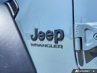 This Jeep Wrangler has a dependable ERC 3.6L Pentastar(TM) VVT V6 engine w/ESS engine powering this... (image 9)