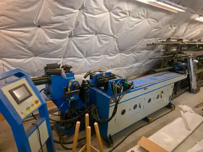A custom made CNC tube bender , up to 1 1/2". It is practically Brand new, only used about 10 times....