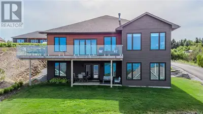This custom-built, modern, executive-style home is constructed with ICF for maximum efficiency. This...