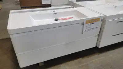 Modernisez votre salle de bain avec ce meuble-vasque mural élégant et moderne, doté d'un plan de tra...