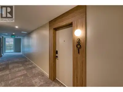 Mountain-View Corner Unit with Wrap-Around Deck! Welcome to Unit 201 at ZARA, Lakestone – a brand-ne...