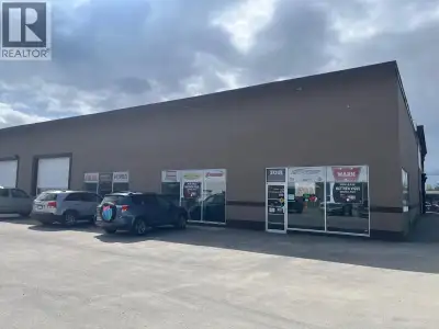 Position your business in this high-exposure industrial building just off busy 15th Avenue, ideally...