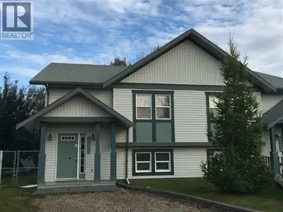 Smart Start! Build pride and equity with this affordable half-duplex tucked on a quiet crescent near...