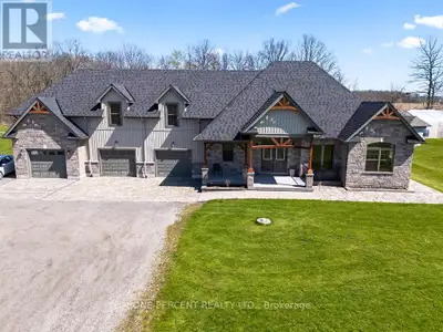 Welcome to 3265 Mountain Road - a beautifully maintained bungalow with an attached 3-car garage and...