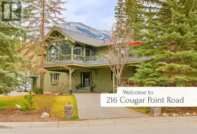Welcome to a truly rare offering on the coveted sunny side of Canmore—where mountain living meets sp...