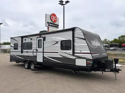 The 2017 Pioneer RG26 is a versatile travel trailer toy hauler designed with a functional layout tha...