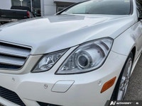 Step into elegance with this 2011 Mercedes-Benz E-Class E 550 Coupe, showcasing a crisp White exteri... (image 7)