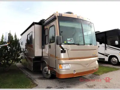 Guarantee RV Calgary's LARGEST selection of pre-owned inventory - / - Triple Slide, Rear Queen Bed S...