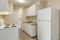Amenities: Spacious Rooms • Affordable Parking • Heat & Water Included Suite & Building: Bachelor an... (image 4)