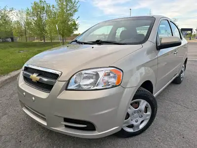 2011 CHEVROLET AVEO , 4 cylindres 1.6 litres , automatique , comme neuf , aucun accident , 96.000 KM...