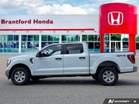 Unleash the power and capability of this 2022 Ford F-150 Crew Cab Pickup. This robust truck boasts a... (image 1)