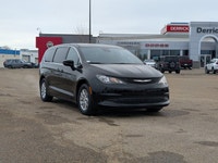 The 2026 Chrysler Grand Caravan SXT in Diamond Black Crystal Pearl with a Black interior combines fa... (image 8)