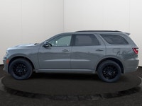 Experience the ultimate fusion of muscle-car attitude and three-row utility in this aggressive SUV,... (image 2)