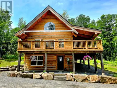 Welcome to Your Newly constructed Dream Log Home in Algonquin Heights Estates This is a rare opportu...