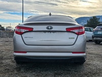 Experience the elegant blend of style and efficiency with the 2012 Kia Optima Hybrid, finished in a... (image 5)