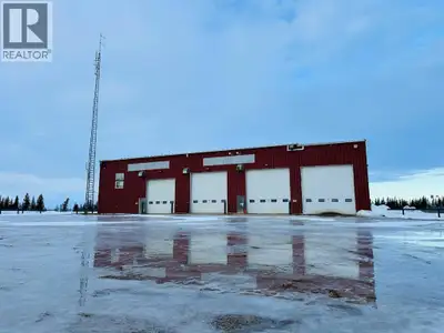 Almost 92 Acres and 4 drive through shop bays and a 10 ton crane on busy highway 2 all for a fractio...