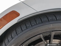 * Drivetrain: 4MOTION AWD with rear-axle torque vectoring. * Akrapovic Titanium Exhaust: Provides an... (image 9)