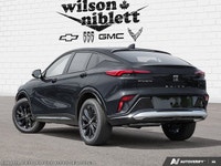 Sleek black exterior with modern design - Heated steering wheel for cold weather comfort - Adaptive... (image 3)