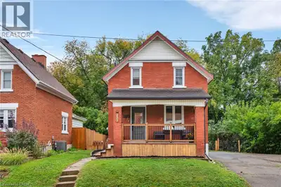 Welcome to 257 Guelph Street, a charming 1.5-storey detached home tucked into an established Kitchen...