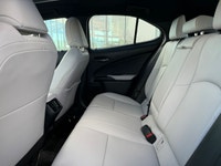 This 2024 Lexus UX 250h Premium presents a strong expression of its crossover qualities, with a bold... (image 8)