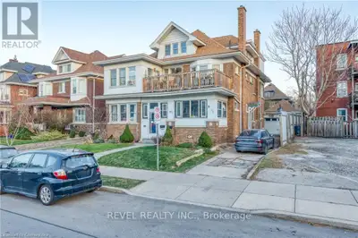LEGAL non-conforming triplex situated on a quiet boulevard in the Hamilton downtown core. This massi...