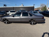 All vehicles come with a full vehicle History Report, ask to see it! 1996 chevy impala SS 22 inch wh... (image 4)