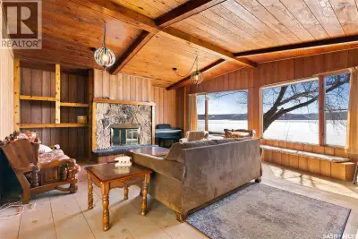 With over 100 feet of prime Pasqua Lake frontage, this fully winterized 4-season property offers ple...