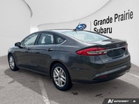 2018 Ford Fusion SE Vehicle Highlights Back Up Camera CarPlay Heated Seats Seamlessly navigate your... (image 2)