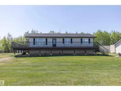 Welcome to this beautifully renovated 1400 sqft bungalow situated on 10 fenced acres in a private co...