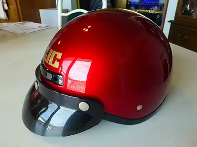 HJC FG-2 motorcycle helmet in candy red. Comes with zip out ears/neck wind blocker for cooler weathe...