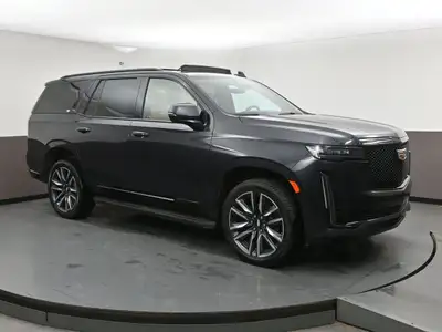 The 2023 Cadillac Escalade Sport is a bold, luxury full-size SUV with a 6.2L V8 engine producing 420...